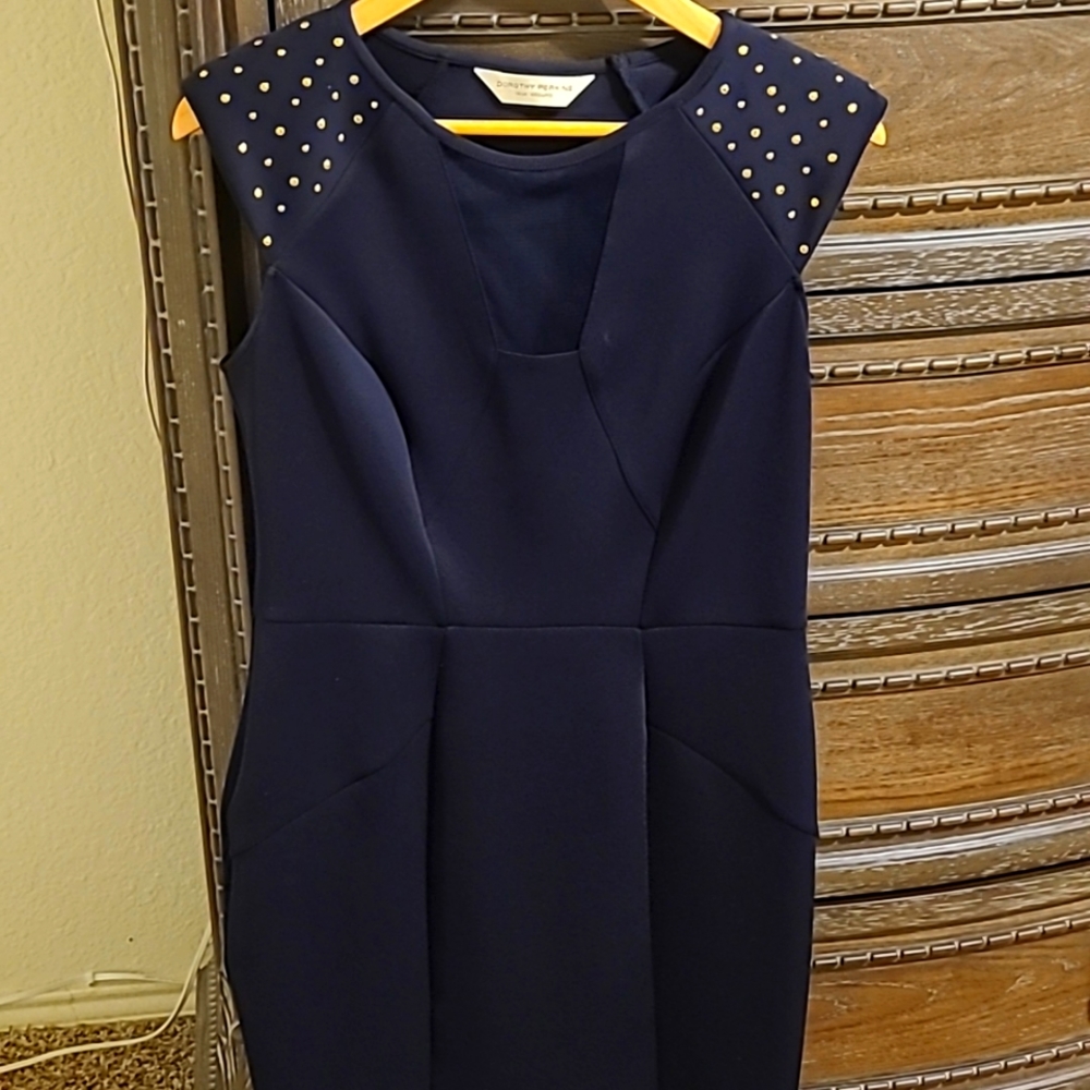 A dress that I wore few times, navy blue.